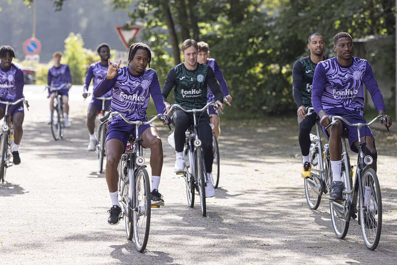 Hibernian FC players riding bicycles